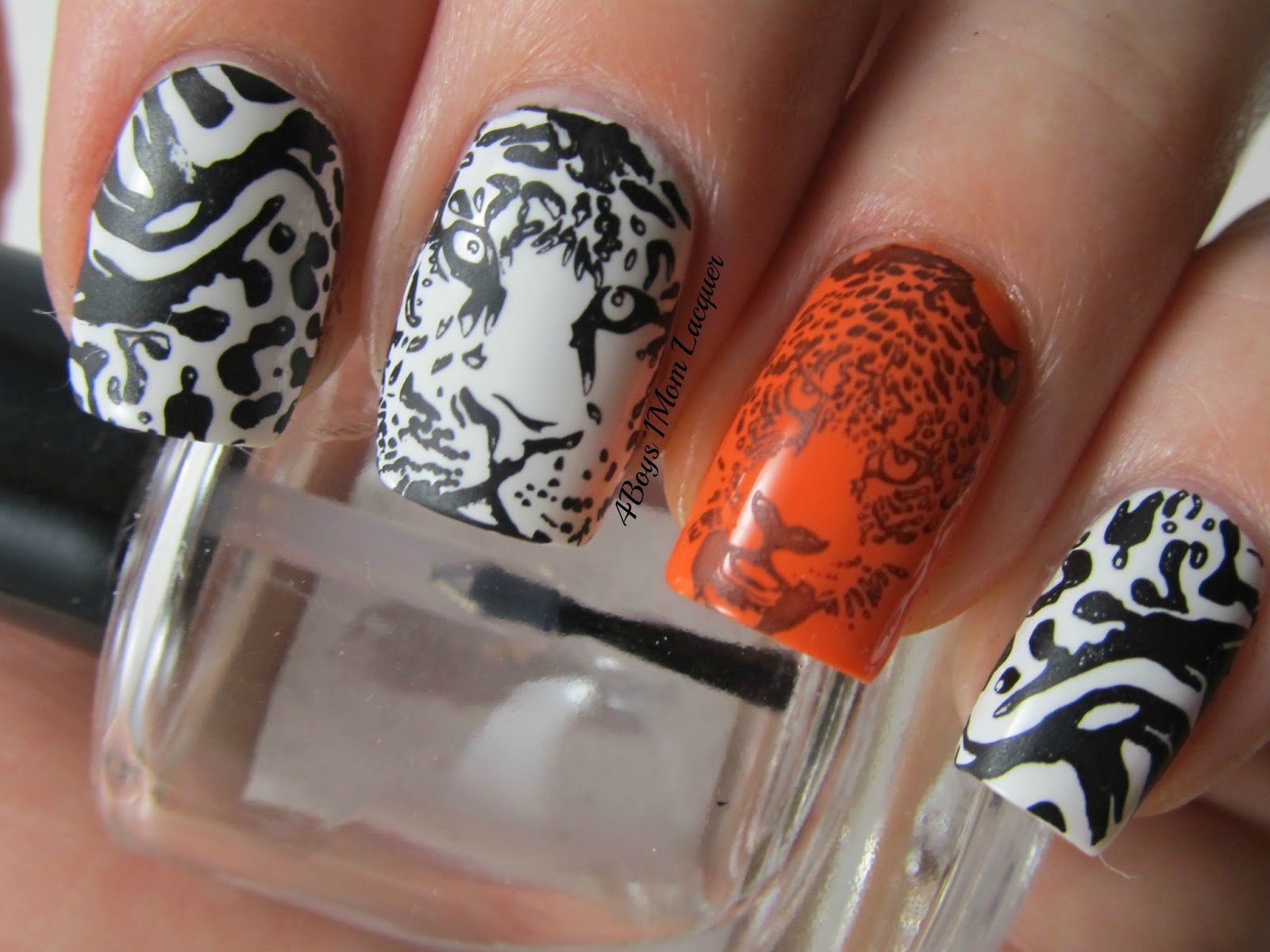 Тигровые ногти дизайн. Тигровые ногти. Маникюр с тигром. Ногти леопард. Дизайн ногтей тигровый.