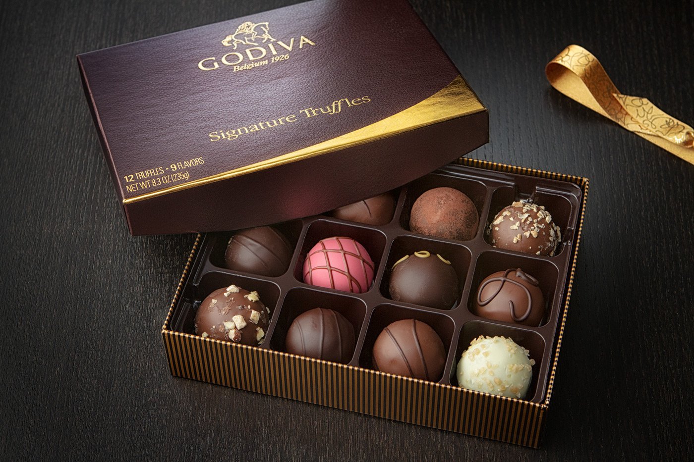 Выбрать конфеты шоколадные. Бельгийские конфеты Годива. Бельгийский шоколад Godiva. Леди Годива конфеты. Бельгийский шоколатье Godiva.