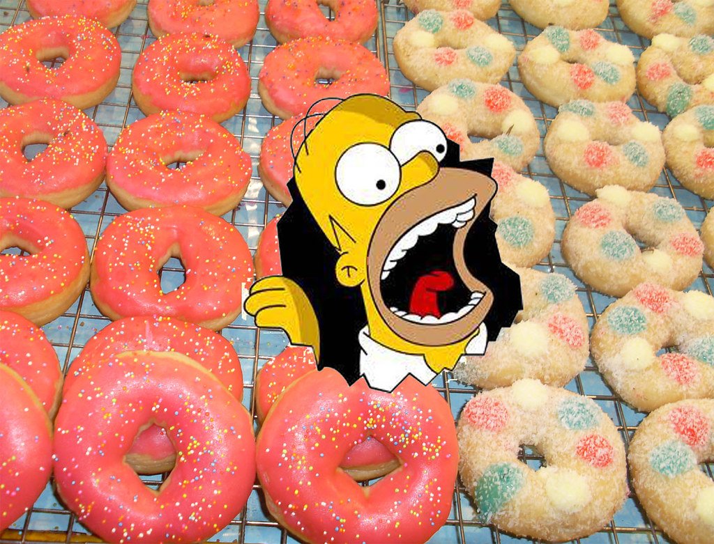 Игра пап пончики. Пончики Гомера Владикавказ. Гомер симпсон с пончиком. Гомер симпсон ест пончик. Дьявольские пончики симпсоны.