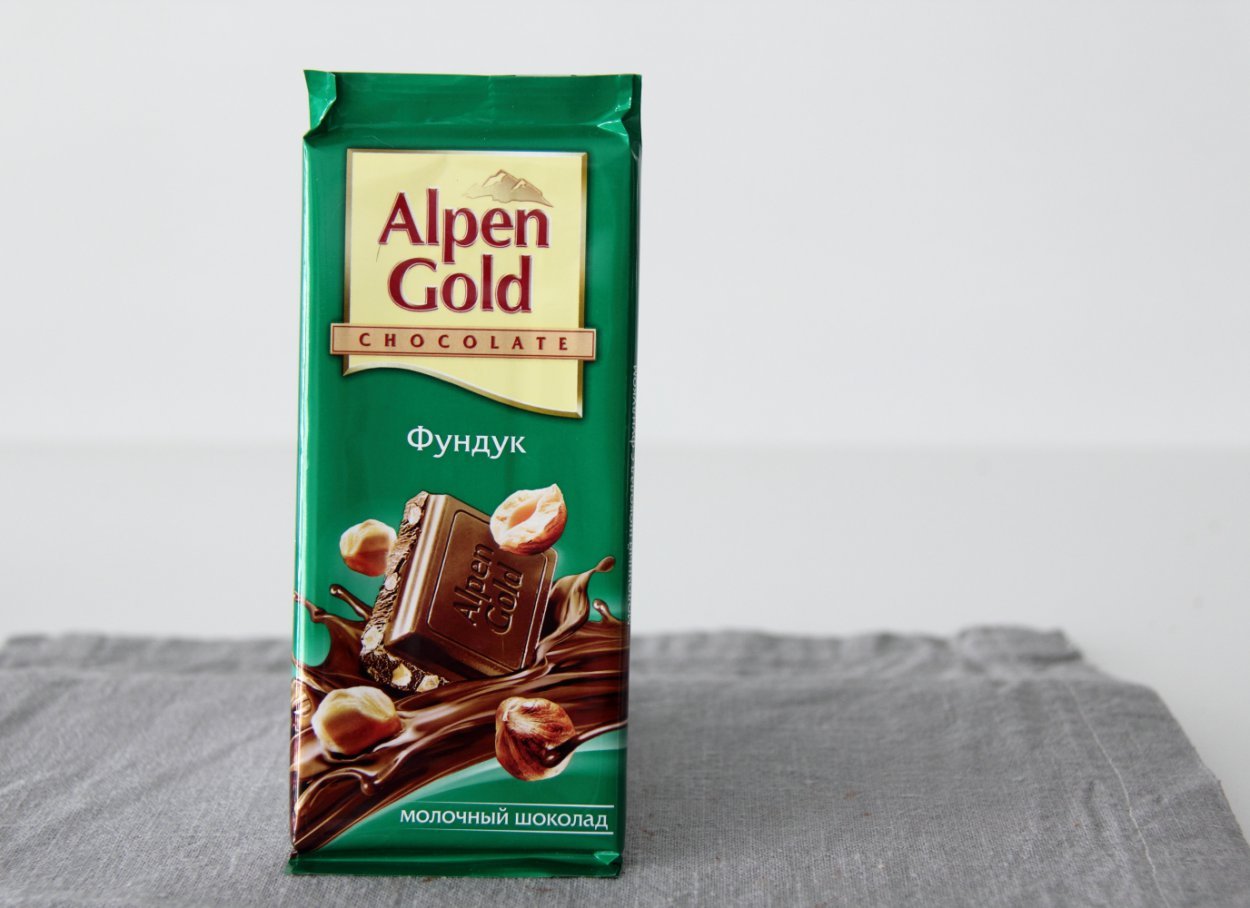 Анпенгольд шоколад. Альпен Гольд Альпен Гольд Альпен Гольд. Шоколад Альпен Гольд. Шоколадка Альпен Гольд. Шоколад с орехами Алпен Гольд.