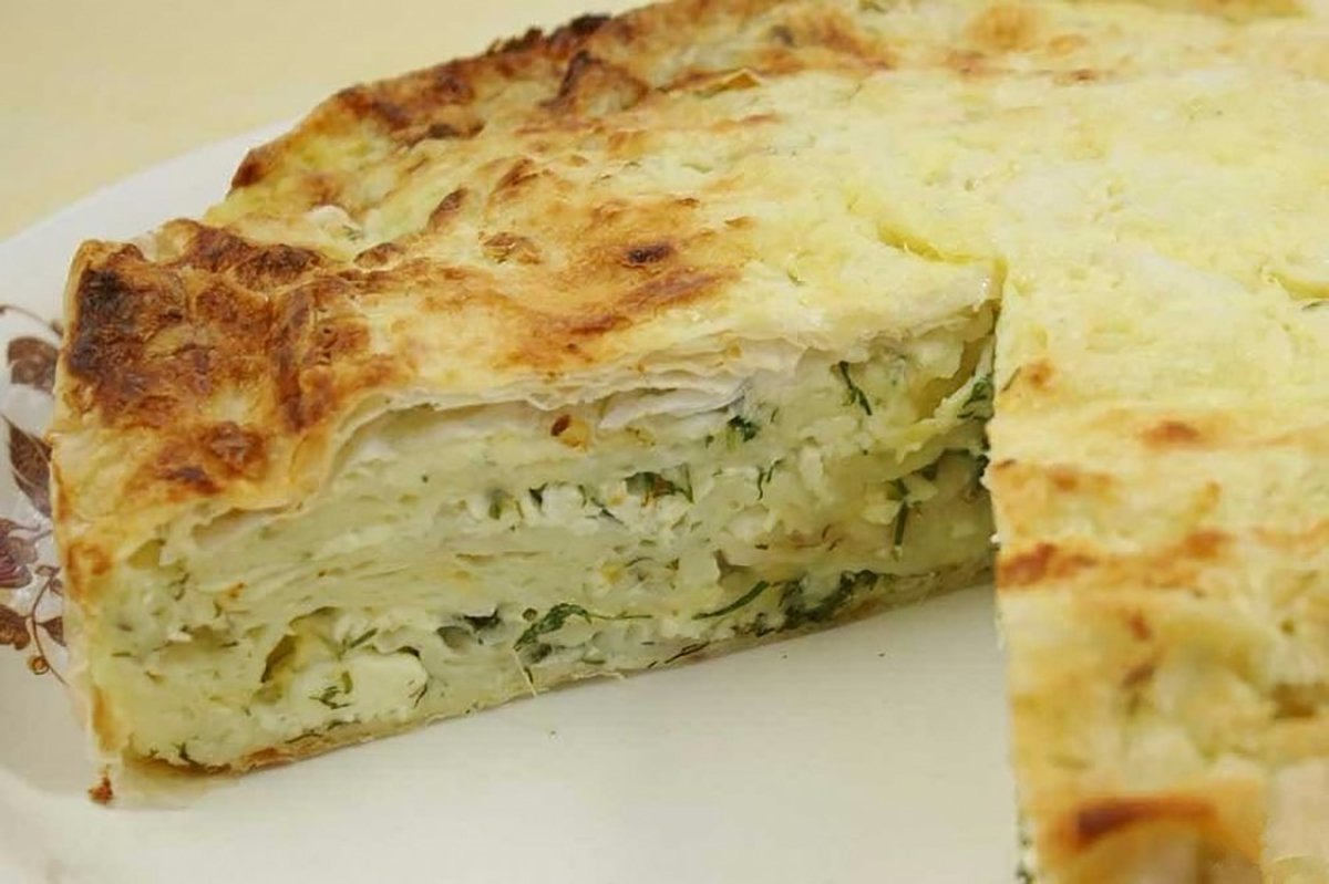 Хачапури ачма. Пирог из лаваша с сыром и зеленью. Сырный пирог из лаваша. Пирог из лаваша с сыром в духовке.